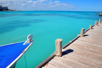 boat in wood pier Cancun tropical Caribbean sea