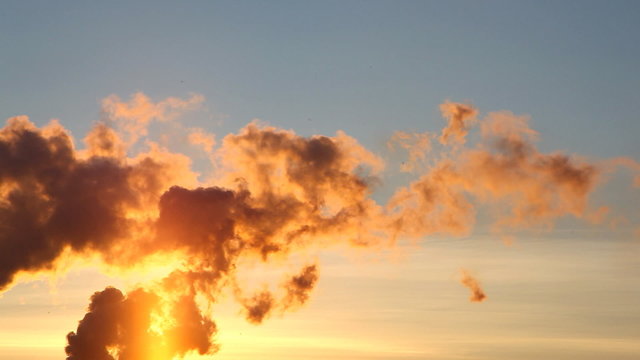 Smoke from pipe of termal power station at sunset
