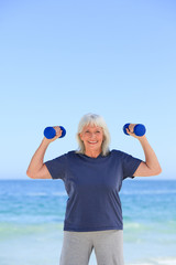 Mature woman doing her exercises