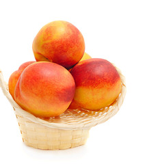 nectarines in basket