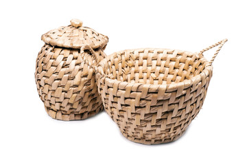Fototapeta na wymiar Wicker basket with two hands, isolated on a white background.