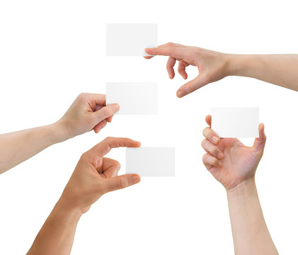 Hands holding blank business cards with copy-space, isolated