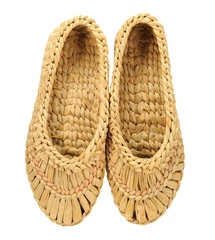 isolated old bast shoes