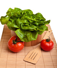 Different ripe vegetables compositions in studio on bamboo