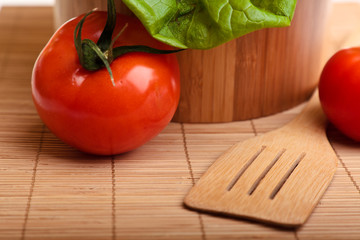 Different ripe vegetables compositions in studio on bamboo