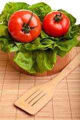 Different ripe vegetables compositions in studio on bamboo