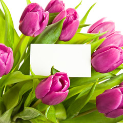 A bunch of pink tulips with business card.