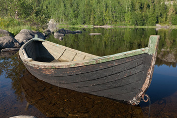 Fototapeta premium Лодка на воде.