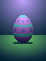 Vibrantly dyed Easter egg under dramatic lighting