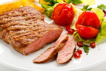 Grilled steak and vegetables