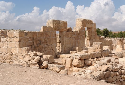 Stone entrance and wall of ruined ancient synagogue