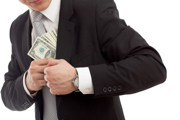 Man in a putting money in his pocket.