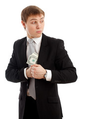 Man in a putting money in his pocket.