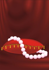 pearl necklace on abstract vinous
