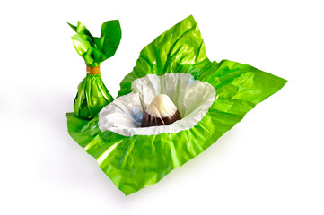 two chocolates wrapped in green