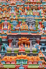 Fototapeta na wymiar Sculptures on Hindu temple tower