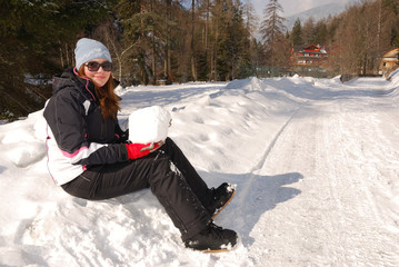Girl with a big snowball