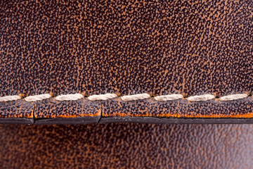 Seam on leather briefcase