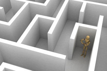 Wooden mannequin lost in maze