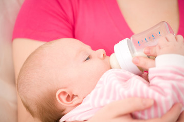Artificial feeding of children.