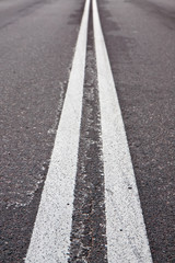 Obraz premium Double white lines on road