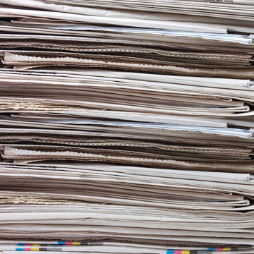 Pile of newspapers close up