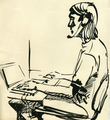 A boy playing on the computer