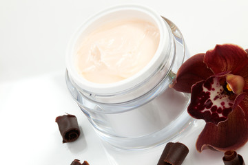 Face cream and orchid flower