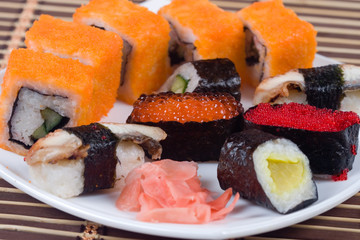 Traditional japanese sushi and rolls close up
