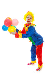 child dressed as colorful funny clown with balloons