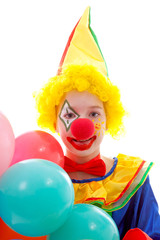 child dressed as colorful funny clown over white background