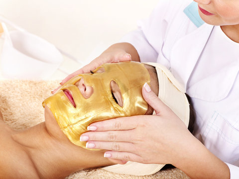 Girl With Gold Facial Mask.