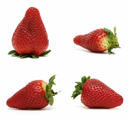 four strawberries of different size and shape