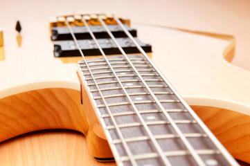 Fototapeta premium Musical concept with wooden guitar