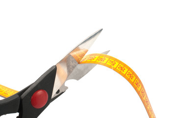 scissors cutting a measuring