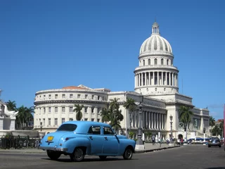 Washable wall murals Cuban vintage cars Street view of Capitolio
