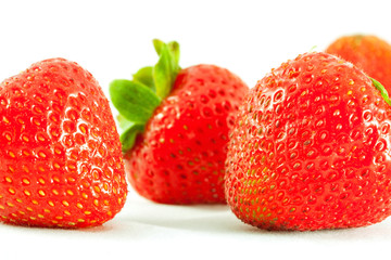 Bright fresh strawberries on a white background. Isolate