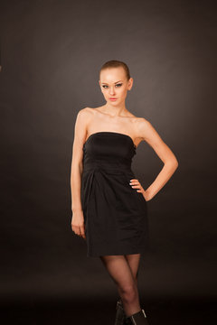 Elegant caucasian girl in black dress