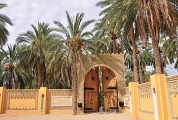 Fotobehang Tunesië Gate of an oasi in Tozeur