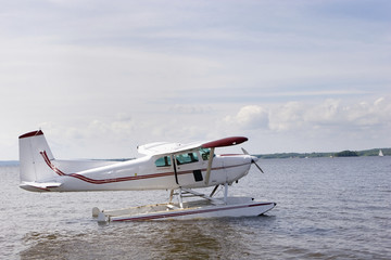Single engine plane on a lake
