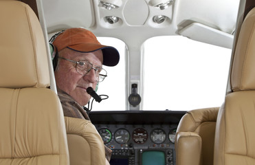 Pilot looking at passenger compartment in a Cessna twin engine