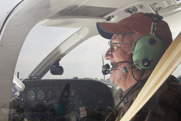 Senior Pilot in the cockpit of a Cessna twin engine