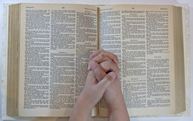 Praying on a Bible