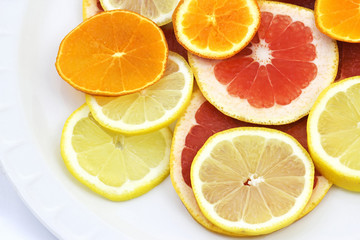 Fototapeta na wymiar Citrus fruit slices