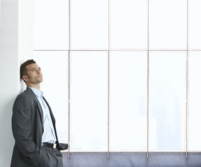 Portrait of businessman thinking