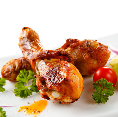 Roasted chicken drumsticks and vegetables