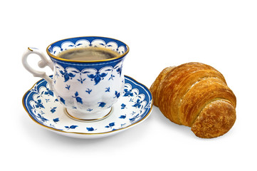 Coffee in a cup with a blue pattern and croissant
