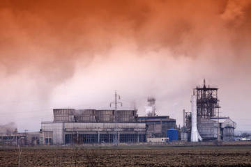 Obraz premium Smoke coming out of factory chimney