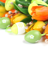Fototapeta na wymiar Green Easter eggs and tulips border