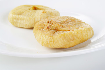dry fig on white dish